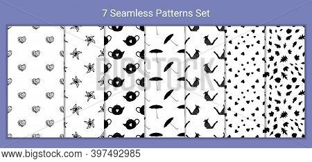 Set Of 7 Monochrome Seamless Patterns With Hand Drawn Doodle Flowers, Birds, Hearts. Stock Vector