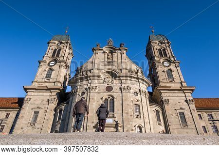 Einsiedeln, Switzerland - November 25, 2020: The Benedictine Abbey Of Einsiedeln With Its Mighty Bas
