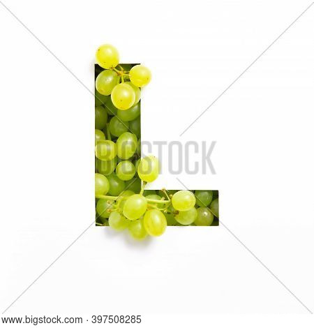 Letter L Of English Alphabet Of Green Grape And Cut Paper Isolated On White. Appetizing Typeface Mad