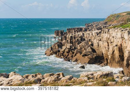 Peniche Sea Cliffs With Atlantic Ocean In Portugal