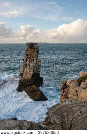 Peniche Sea Cliffs With Berlengas Island On The Background With Atlantic Ocean, In Portugal