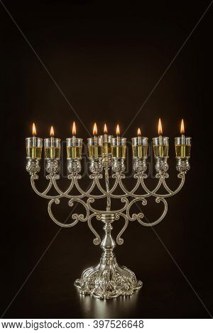 Jewish Festival Of Lights Holiday Symbol Hanukkah Menorah In Hanukkiah On Oil Candles