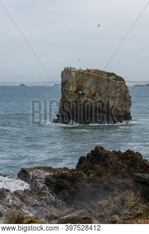 Sea Cliffs In Papoa Cabo Carvoeiro Cape In Peniche, Portugal