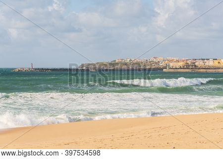 Supertubos Beach Surfing Paradise In Peniche With Lighthouse, In Portugal