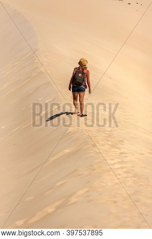 Sotovento, Fuerteventura, Spain: 2020 October 8: Young Blonde Woman Walks Through The Dunes At Playa