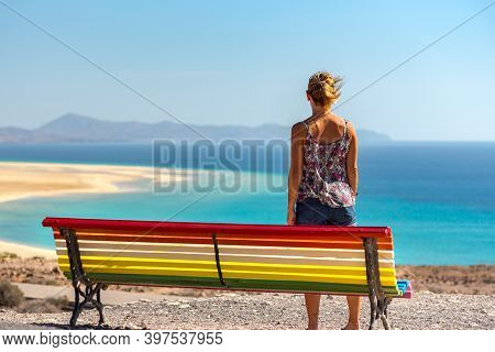 Young Blonde Woman On Sotavento Beach, Fuerteventura In Spain.