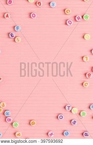 Alphabet beads border pink wallpaper text space