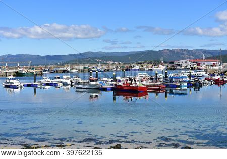 Portosin, Spain. June 19, 2020. Bay With Galician Fishing Vessels In A Harbor At Famous Rias Baixas 