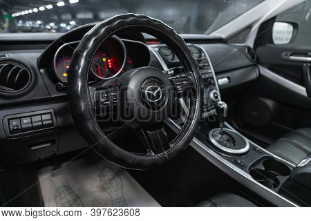 Novosibirsk, Russia - November 26, 2020: Mazda Cx7, Dashboard, Player, Steering Wheel With Logo And 