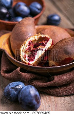 Homemade Pirogi With Plum, Traditional Russian Pastries.