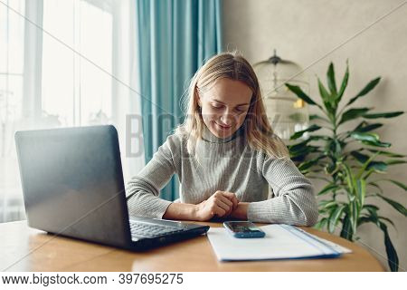 Adoult Woman 35s And Talking Online Chat With A Colleague On The Phone At Home, Work From Home, Stay