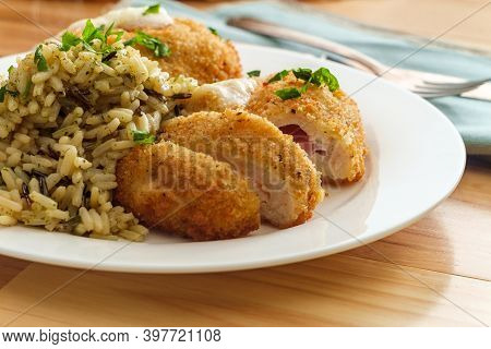 Chicken Cordon Bleu Served With Herbed Long Grain Wild Rice Mix