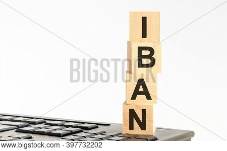 Concept Image A Wooden Block And Word - Iban - On White Background. The Cubes Are Located On The Key