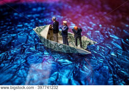 Miniature Figurine Businessmen Ride On Dollar Bill Origami Yacht
