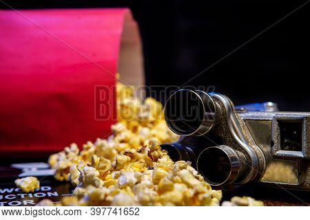 Movie Theater Popcorn With Butter And Blue Backlighting