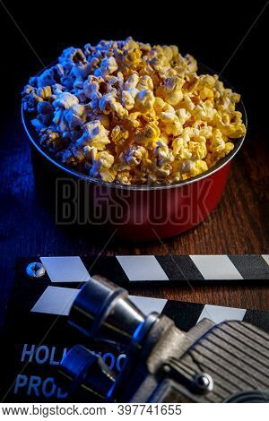 Movie Theater Popcorn With Butter And Blue Backlighting