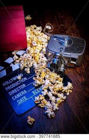 Movie Theater Popcorn With Butter And Blue Backlighting