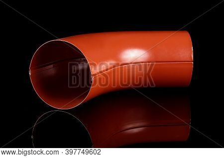 Bend Element For Rain Water Spout For Industrial Constructions Isolated On The Black Background