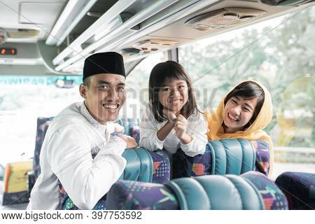 Muslim Holiday Trip Riding A Bus Together With Family