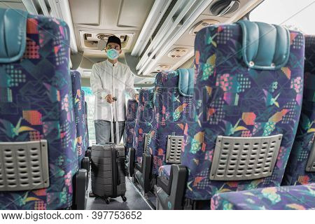 Male Muslim Travel By Bus During Pandemic