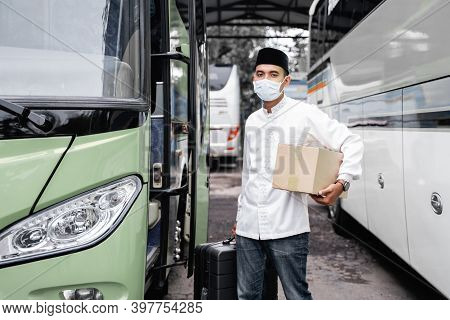Male Muslim Travel By Bus During Pandemic