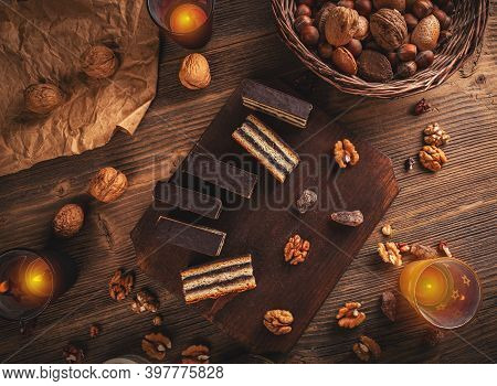 Hungarian Gerbeaud Layered Cake With Walnut And Apricot Jam Filling, Covered With Chocolate Glaze