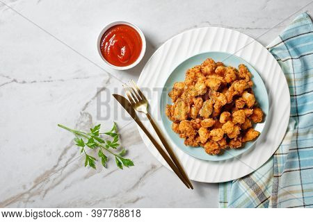 Popcorn Chicken - American Fast Food Dish Of Bite-sized Chicken Pieces Breaded And Fried, Served On 