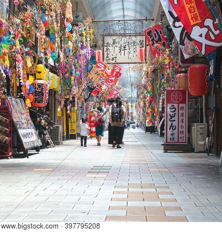 Beppu, Oita, Japan, July 12, 2017 : Small Shops And Eateries In A Covered Market In The Japanese Cit