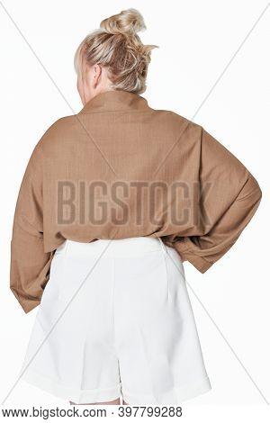 Size inclusive women's fashion brown shirt studio shot