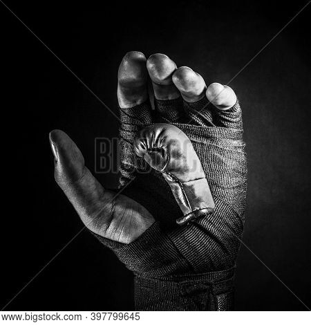 Red Boxing Glove In A Mans Hand