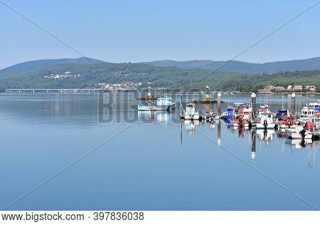 Noia, Spain. September 12, 2020. Harbor And Galician Fishing Vessels With Water Reflections. Porto D