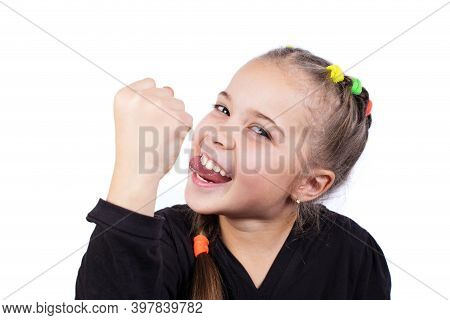 Funny Girl With Fist. Girl Shows Tounge And Fist.