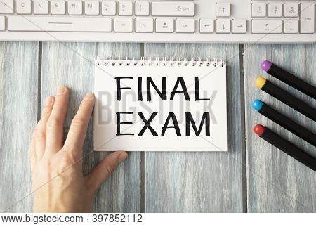 Final Exam Message On The Card Shown By A Wooman