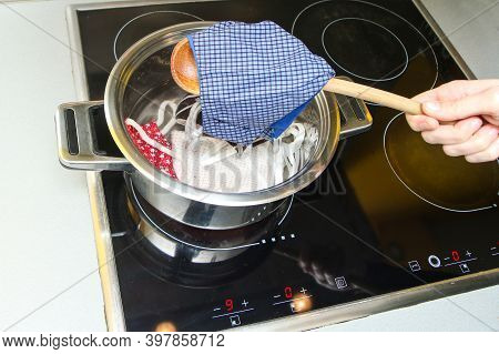 The Detail Of Boiling Of Home Made Provisional Textile Masks To Remove All The Bacteria And Viruses 