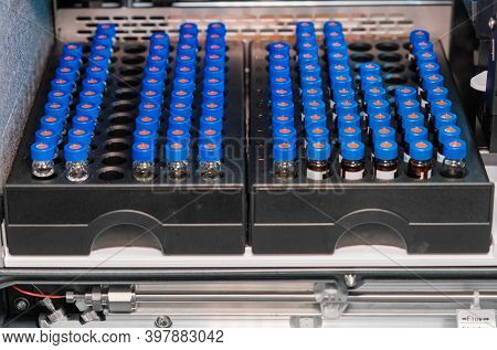 Hplc Glass Vials In The Rack. Research And Development Of Pharmaceuticals And Vaccines. High Perform