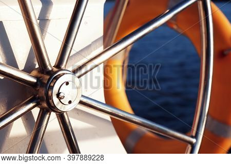 Yacht Steering Wheel On Sunny Day Wallpaper. Water Sport Background. White Boat Cruise Banner. Metal