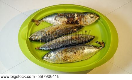 Pindang Fish After Frying Is Served On A Green Plate