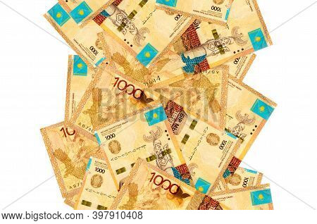 1000 Kazakhstani Tenge Bills Flying Down Isolated On White. Many Banknotes Falling With White Copysp