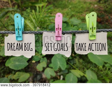 Inspirational And Motivational Text - Dream Big Set Goals Take Action. Stock Photo.