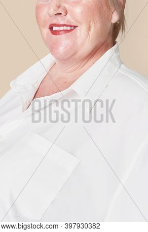 Size inclusive women's fashion white shirt studio shot