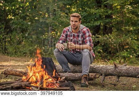 Man Relaxing In Park. Hiking Adventure. Picnic In Tourism Camp. Drink Coffee At Picnic Campfire. Get