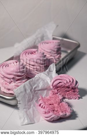 Pink Strawberry Homemade Zephyr Or Marshmallow In A Rectangular Oleum Plate, Two Halves