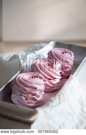 Pink Strawberry Homemade Zephyr Or Marshmallow In A Rectangular Oleum Plate. Side View, Close-up, Se