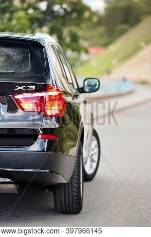 Grodno, Belarus - June 2020: Bmw X3 Ii F25 2.0i Xdrive Part Rear Outdoors On Sunny Road Background O