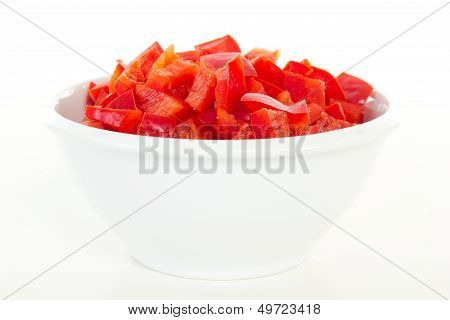 Cutted Red Peppers In White Bowl