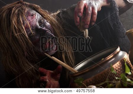 Witch Brews A Potion With A Snail