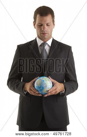 Businessman holding globe