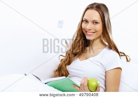 Young woman with notebook