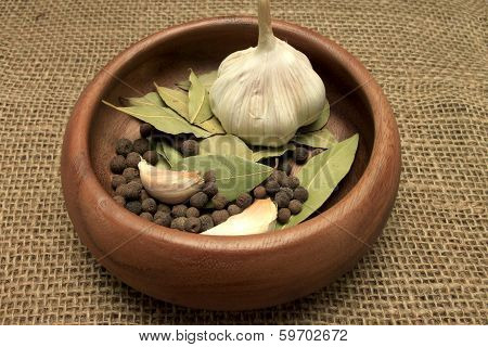 Garlic And Pepper On A Burlap Beautifully Coiffed