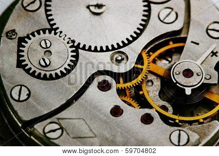 Clockwork details, pinions and wheels closeup